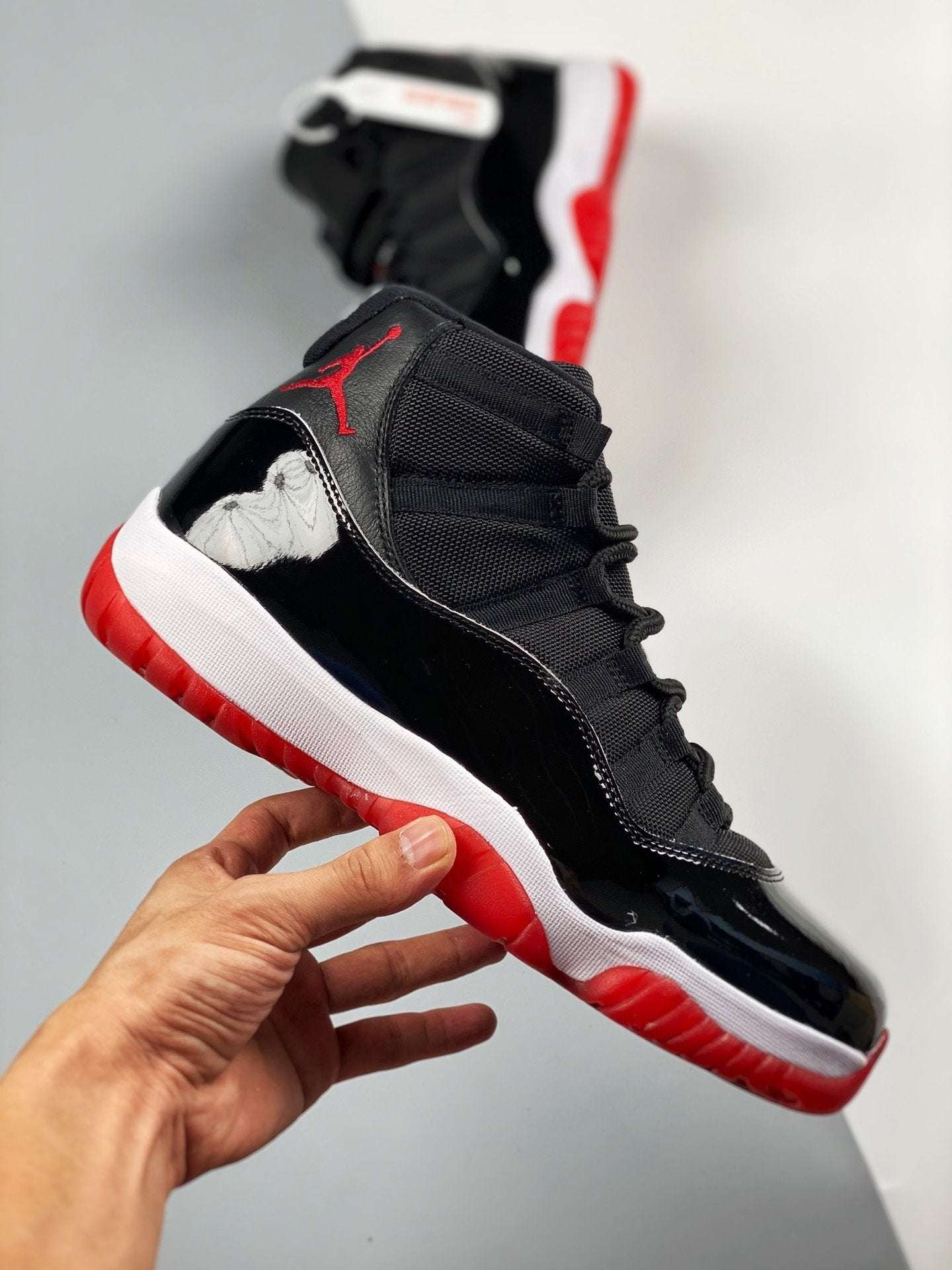 NikeAirJordan11Bred2019BlackWhiteVarsityRed_1_31928adc-0ad7-48a9-b19e-b4828738c9fc Nike Air Jordan 11 Bred 2019 Black White Varsity Red - Image 1